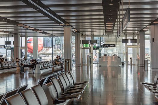 Airport lounge interior with seating and amenities