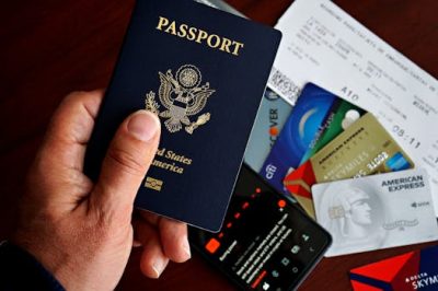 traveller with passport and credit card