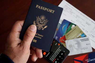 traveller with passport and credit card