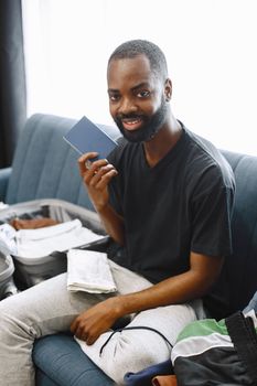 Traveller holding a passport and boarding pass
